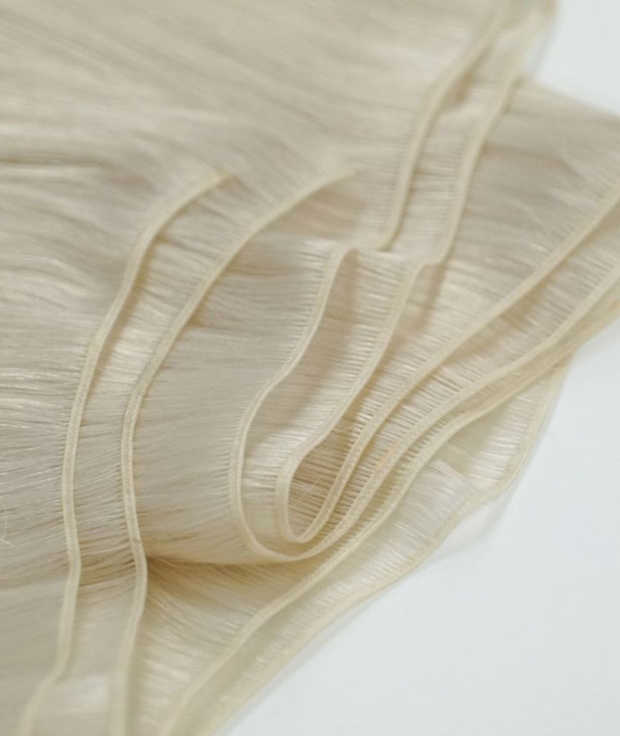 #60 Whitest Ash Blonde Genius Weft Extensions