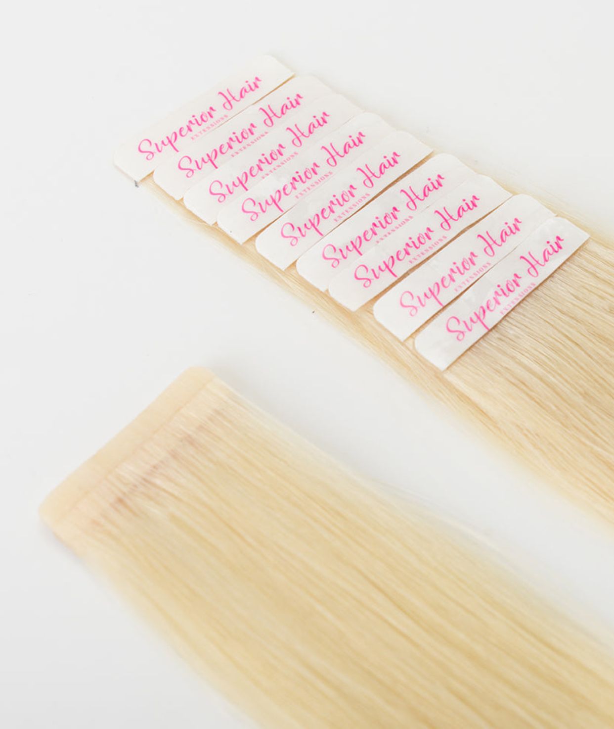 #613 Platinum Blonde Seamless Tape In Extensions