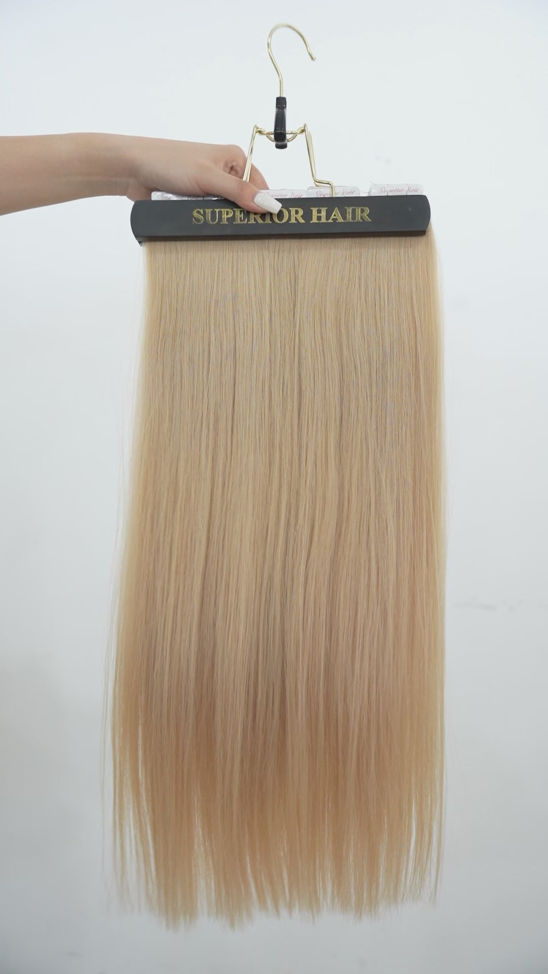 Load video: #Dirty Blonde Seamless Tape In Hair Extensions (NEW)