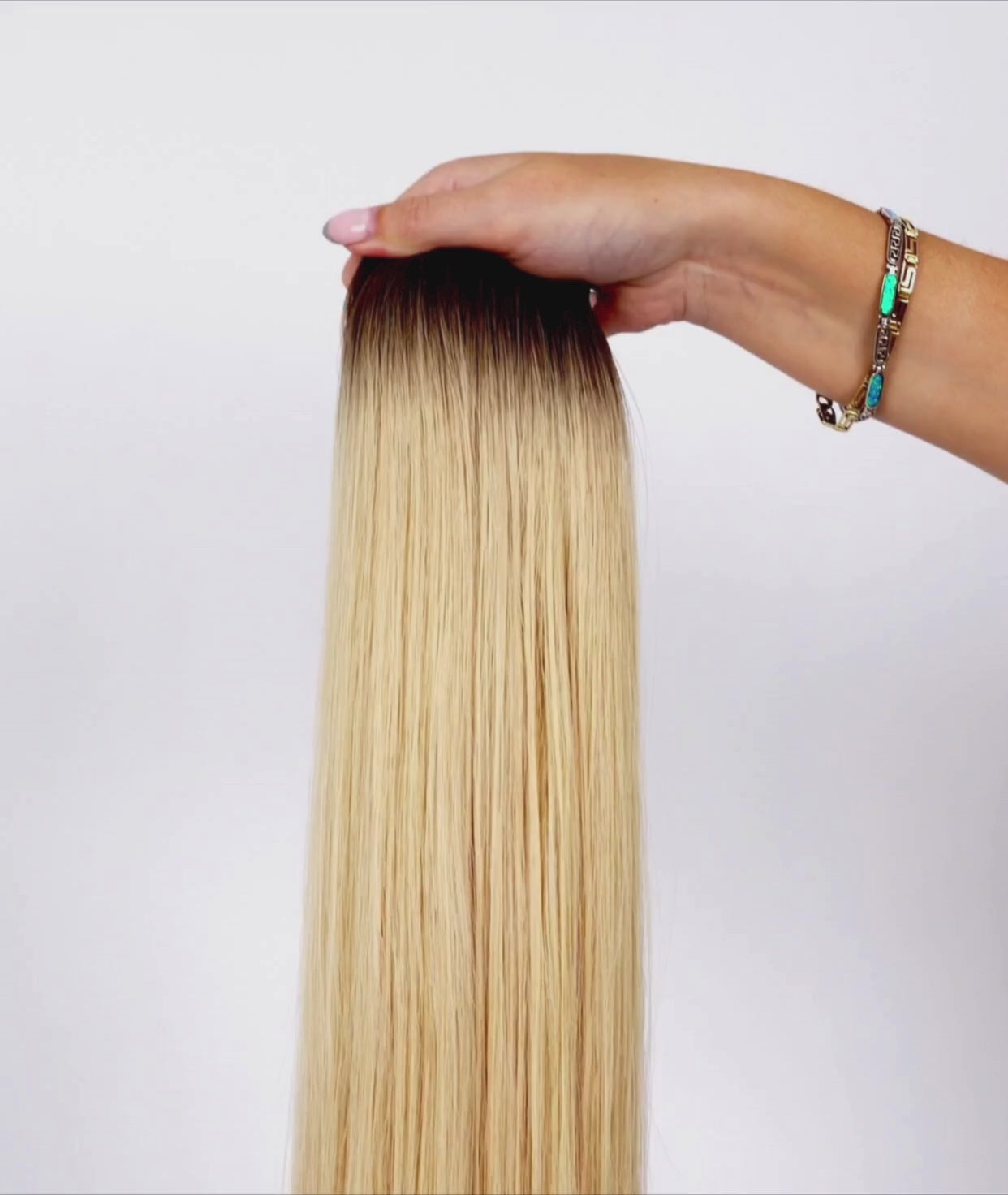 Load video: #Rooted Hollywood Blonde Butterfly Genius Weft Extensions (NEW)